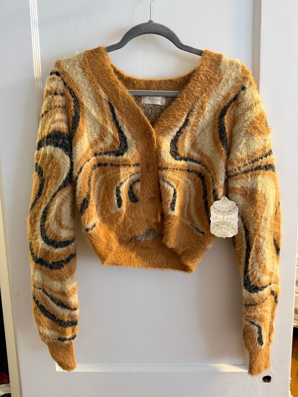 Altar’d State Fuzzy Swirl Pattern Cropped Cardigan in Mustard and Black